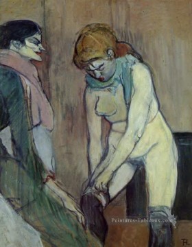 femme tirant ses bas 1894 Toulouse Lautrec Henri de Peinture à l'huile